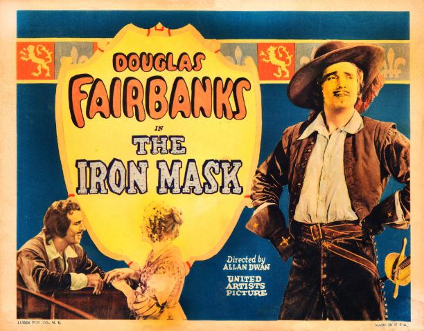 1iron_mask_lobby_card_x-612x479
